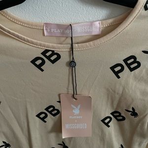 Missguided X Playboy bodysuit in a cream color